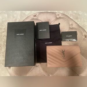 SAINT LAURENT
Cassandre leather wallet on chain